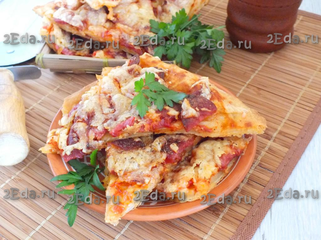 Мини пиццы из слоеного теста в духовке рецепт с фото пошагово